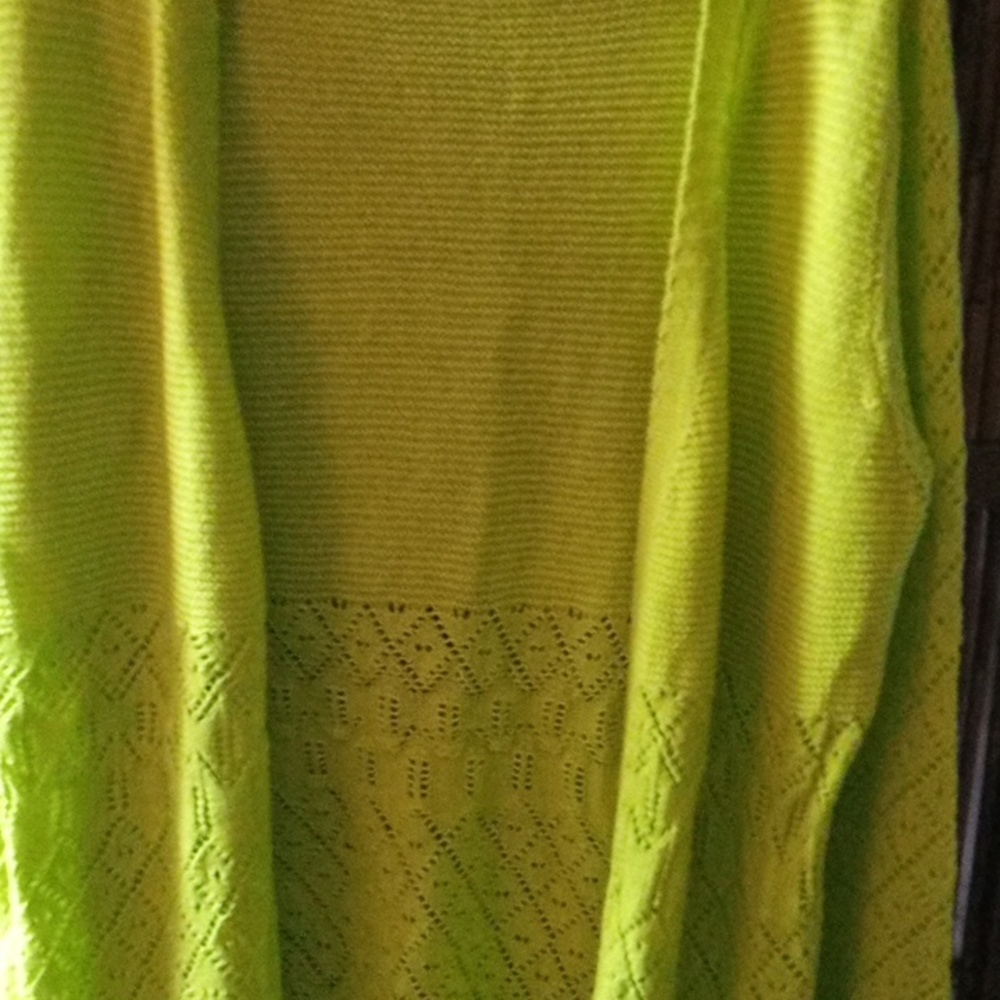 Long sleeve lime green sweater with nice crochet details.